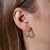Brinco Curled Dourado - Unic Joias