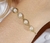 Pulseira Clara Pérolas Dourado na internet