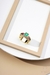 Anel Solitário Serenity Dourado Zircônia Esmeralda - comprar online