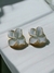 arete flor blanca