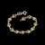 551138 - Pulseira Rommanel folheada a ouro infantil formada por rosas - loja online