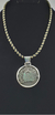 Image of Dije De Quetzalcoatl De Plata Ley .925 Con Collar De Piel