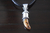 Dije De Colmillo De Piedra Natural Montado En Plata Ley .950