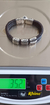 Pulsera De Piel Tejida Color Chocolate Con Grecas De Plata en internet