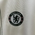 camisa-chelsea-ii-25-26-torcedor-nike-masculina-branca-com-detalhes-em-azul-e-vermelho