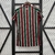camisa-fluminense-i-25-26-torcedor-umbro-feminina-vermelha-e-verde-com-detalhes-em-branco