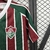 camisa-fluminense-i-25-26-torcedor-umbro-feminina-vermelha-e-verde-com-detalhes-em-branco