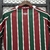 camisa-fluminense-i-25-26-torcedor-umbro-feminina-vermelha-e-verde-com-detalhes-em-branco