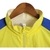 Imagem do Jaqueta Corta-Vento Al-Nassr 23/24 dupla face - Masculina Duneus - Amarela com detalhes em azul