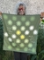 Pañuelo SOLES verde 70x70 - Paola Blaustein