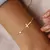 Birthstone zircônia fina elo de corrente cruz pulseira de aço inoxidável femi - comprar online
