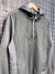 buzo AUTHENTIC gris en internet