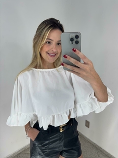 Blusa tipo Capa na internet