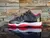 Nike Air Jordan 11 Low en Bred - comprar en línea