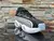 Nike Nocta Glide en Negro con Blanco en Lineas en internet