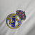 Imagem do Camisa Real de Madrid I 25/26 - Torcedor Adidas Masculina - Branca com detalhes em cinza e amarelo