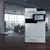 Impresora RICOH IM 370F ubicada en una oficina, lista para su uso profesional