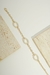 Pulseira detalhes em pérolas