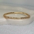 Bracelete Joinha Cravejado - comprar online