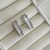 Brinco Argola Oval Com Zirconias Baguete - comprar online