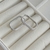 Imagem do Brinco Argola Oval Media Meio Cravejada