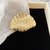 Broche Ostra Dorado