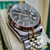 Kit Rolex Sky-Dweller Preto Misto Dourado Aro Frisado Safira Automatico Pulseira Jubilee