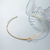 Choker Laço Dourado na internet