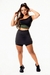 Conjunto Fitness Feminino Short Saia Preto Cintura Alta e Cropped Um Ombro Só Preto com Verde - Estilo e Performance Exclusivos
