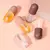 Imagem do Líquido Plumping Dia e Noite! óleo de hortelã-pimenta e óleo de gengibre, ele promete lábios macios e volumosos.Hidratante
