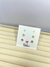Trio coração vazado, estrela laminada e ponto de luz dourado