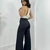 Calça Pantalona Alfaiataria a trás.