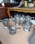 Juego de servicio antiguo de bronce bañado en plata