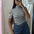 REMERA CON CUELLO Y MANGA PRINCESAS - comprar online
