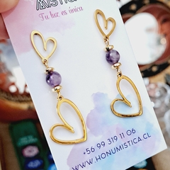 Aros con piedra amatista en acero dorado