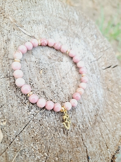 Pulsera de piedra Rodocrosita y dije flor de loto de acero