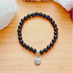 Pulsera de piedra Turmalina negra y dije San Benito. - tienda en línea