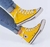 Tênis Botinha Converse Amarelo na internet