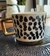 TAZA CON BORDE DORADO "LUNARES"