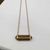 Colar de Aço Inox Dourado com Biponta de Olho de Tigre - comprar online