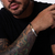 Pulseira Evoke em Aço com Dourado na internet