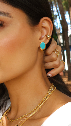 BRINCO OVAL ESMALTADO TURQUESA na internet