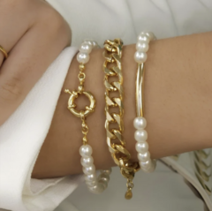PULSEIRA DE PÉROLAS COM TUBO NO OURO na internet