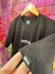 Camiseta Wats World Preta na internet