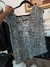 Musculosa animal print estampada en internet