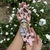 Denario Virgencita (Flores rosadas - Virgen azul)