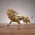 Escultura Leão Dourado na internet