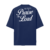 Camiseta oversized azul marinho com a frase "PRAISE THE LORD" em destaque na parte de trás, com detalhes escrito “LET EVERYTHING THAT HAS BREATH”