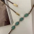 CHOKER MARROM PEDRAS VERDES - comprar online