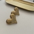 BRINCO CORAÇÃO DOURADO AÇO INOXIDAVEL - comprar online
